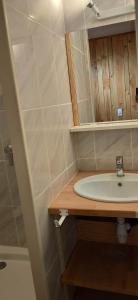 a bathroom with a sink and a mirror at Freisquéro in Bandol +27 photos