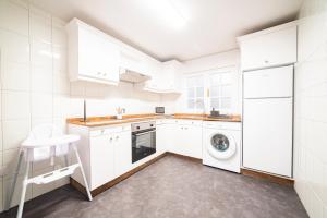 Η κουζίνα ή μικρή κουζίνα στο Apartamento Carmiña