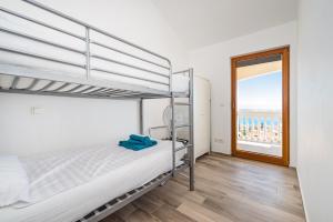 Katil atau katil-katil dalam bilik di Ferienhaus Inselglück auf Ugljan - Zadar +36 gambar