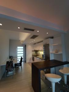 Fotografie z fotogalerie ubytování Peramos View Luxury Maisonette v destinaci Néa Péramos