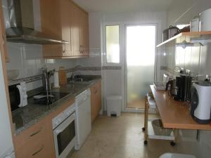 A kitchen or kitchenette at 2197-Superb 2bedrooms in residence with pool!