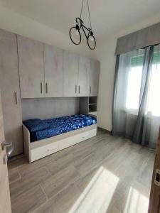 Säng eller sängar i ett rum på Appartamento zona Novoli