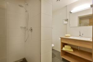 Koupelna v ubytování Hotel Garni Tirolerhof
