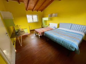 Katil atau katil-katil dalam bilik di Lussuosa villa vicino alla stazione