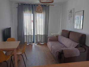 Posedenie v ubytovaní Apartamentos Cala San Pedro