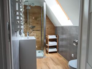 Koupelna v ubytování TWOJA CHATA Apartamenty pod niebem zarezerwuj na podhalami pl