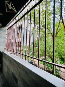 a building with a fence and a window at City Center Cozy 3Bedroom Apartment with Unique Design and Hot Tub , 2Bathroom, Middle of Center, By Republic Square in Yerevan