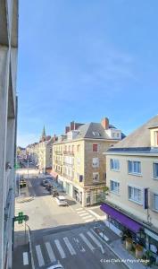 an aerial view of a city street with buildings at Bel appartement au cœur de Lisieux, parking + wifi in Lisieux
