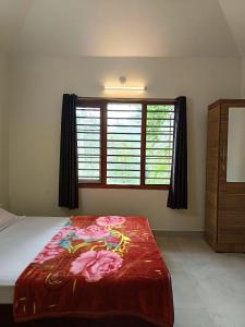 Giường trong phòng chung tại Casita Greenacres Homestay