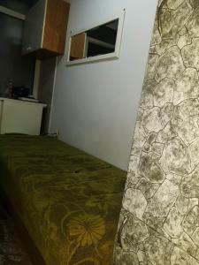 Een bed of bedden in een kamer bij EXIT apartman