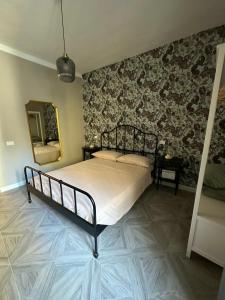 Ein Bett oder Betten in einem Zimmer der Unterkunft Casetta Beatrice Tivoli Holiday Home
