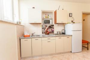 Kuchyň nebo kuchyňský kout v ubytování Nena City Center Apartment