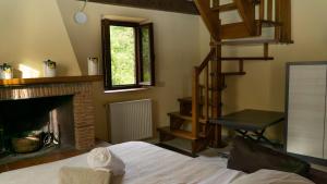 Postel nebo postele na pokoji v ubytování Borgo Giusto Tuscany