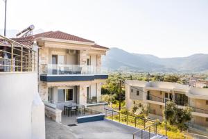 a view from the balcony of a house at ONITES Elegant Suites in Skala Potamias