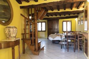 Postel nebo postele na pokoji v ubytování Borgo Giusto Tuscany
