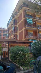 a large building with balconies on the side of it at Montagnola House in Rome