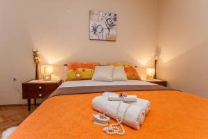 Postel nebo postele na pokoji v ubytování Nena City Center Apartment