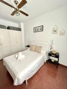 Postel nebo postele na pokoji v ubytování Vera Apartment, acogedor y tranquilo en el corazón de la ciudad
