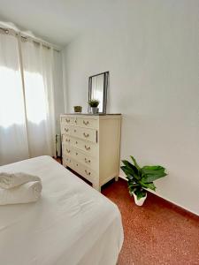 Postel nebo postele na pokoji v ubytování Vera Apartment, acogedor y tranquilo en el corazón de la ciudad