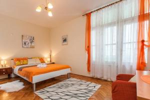 Postel nebo postele na pokoji v ubytování Nena City Center Apartment