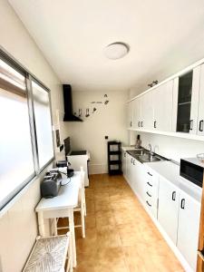 Kuchyň nebo kuchyňský kout v ubytování Vera Apartment, acogedor y tranquilo en el corazón de la ciudad