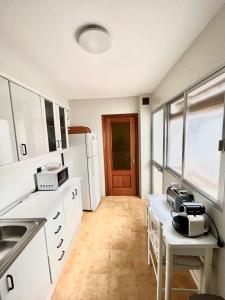 Kuchyň nebo kuchyňský kout v ubytování Vera Apartment, acogedor y tranquilo en el corazón de la ciudad