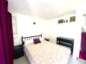 Postel nebo postele na pokoji v ubytování La Casita