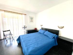 Postel nebo postele na pokoji v ubytování La Casita
