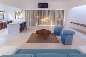 Posezení v ubytování Mi Kasa Tu Kasa Bacalar by Nah Hotels