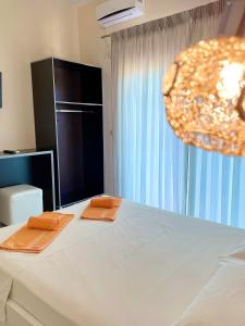 Cama ou camas em um quarto em Marku Palace