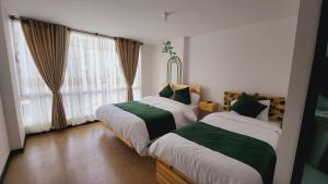 Letto o letti in una camera di Hotel Natural Sevgi