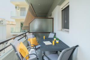 Balkón nebo terasa v ubytování Korai City Vibes