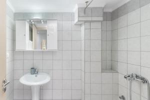 Koupelna v ubytování Korai City Vibes + 21 fotografií