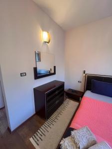 Postel nebo postele na pokoji v ubytování Bey’s GuestHouse