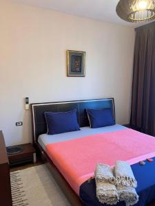 Postel nebo postele na pokoji v ubytování Bey’s GuestHouse