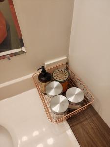 a tray with three plates and a tray with food on it at Economical Homestay in Burnaby