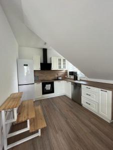 Η κουζίνα ή μικρή κουζίνα στο Apartmány Tobias