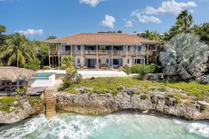 an aerial view of a house with a river at Villa Shores 32 in Kralendijk