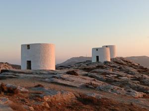 a group of three towers on top of a mountain at Perseids Traditional House in Amorgos