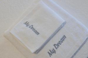 a white bag with the words myopia on it at MY DREAM in Alcains +23 photos