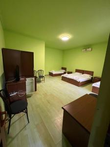 Ένα ή περισσότερα κρεβάτια σε δωμάτιο στο Mareti777