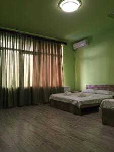 Ένα ή περισσότερα κρεβάτια σε δωμάτιο στο Mareti777