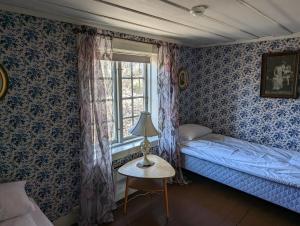 Postel nebo postele na pokoji v ubytování Magasinet + 17 fotografií
