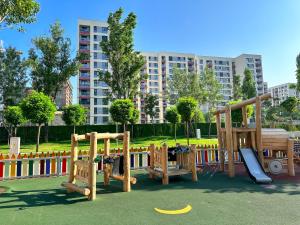 a park with a playground with a slide at Studio 21 in Bucharest