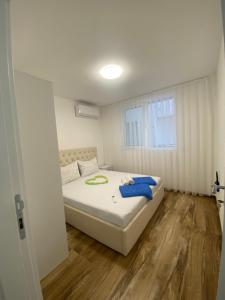 Postel nebo postele na pokoji v ubytování Villa Leona Palushaj