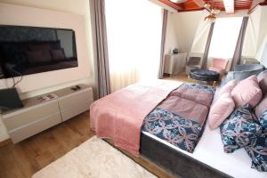 Posteľ alebo postele v izbe v ubytovaní Aranyhaj Apartman + 2 fotografie