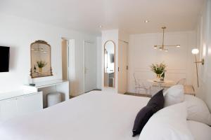 Postel nebo postele na pokoji v ubytování Hotel Marcos Gamero