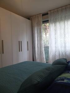 Ein Bett oder Betten in einem Zimmer der Unterkunft Casa di Elisa