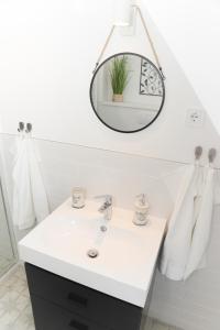 Kúpeľňa v ubytovaní Raba92 Apartman House