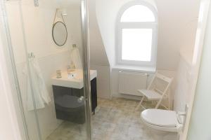 Kúpeľňa v ubytovaní Raba92 Apartman House